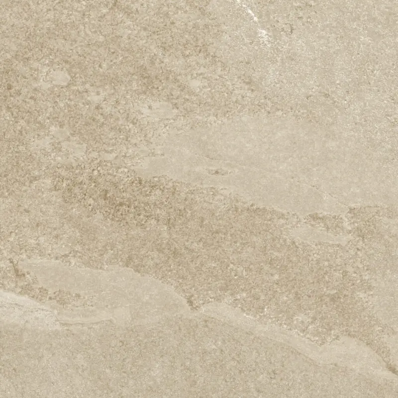 Surface d’un carreau italien en grès cérame effet pierre beige